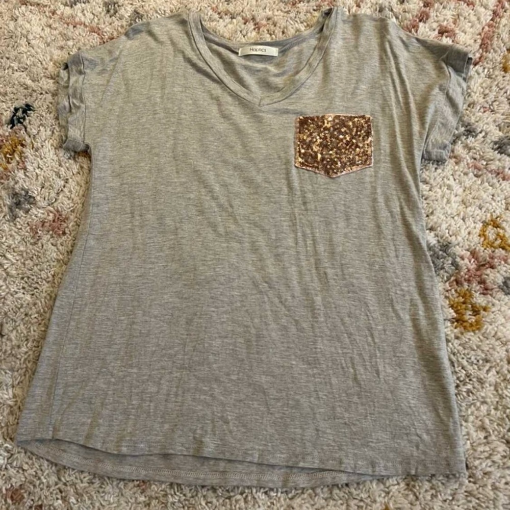 Boutique brand. Size small gray tee with sequin pocket.